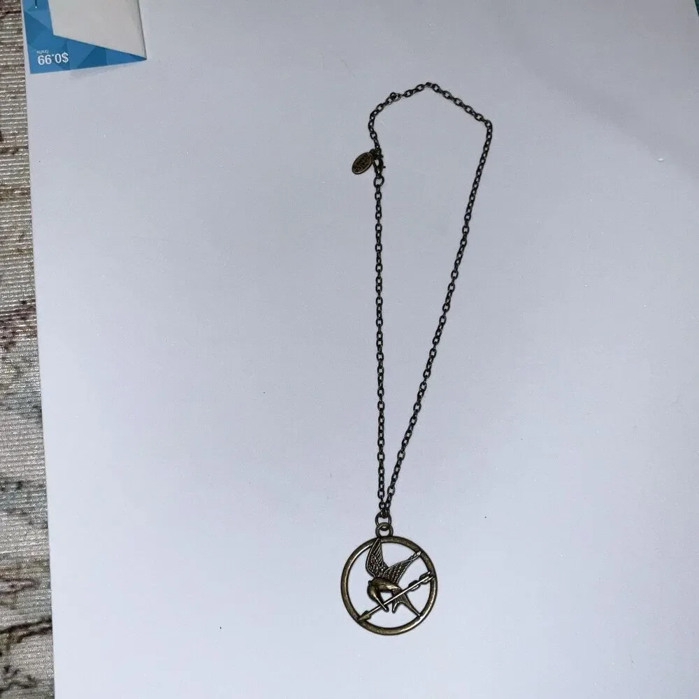 HUNGER GAMES Katniss Mockingjay Pendant Necklace Officially Licensed 2012 NEW